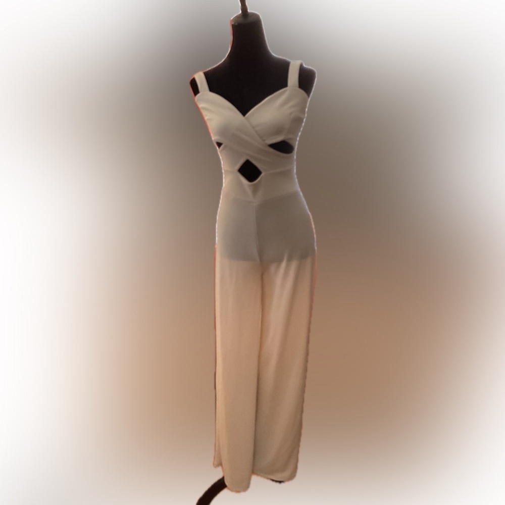 StreetWear Society sleeveless cream jumpsuit with cut out top. Size S